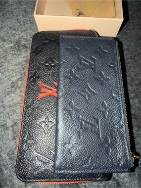 Louis Vuitton Embossed Monogram Leather Wallets in Black and red with insert